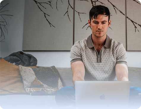 Switch Markets trader working on a laptop
